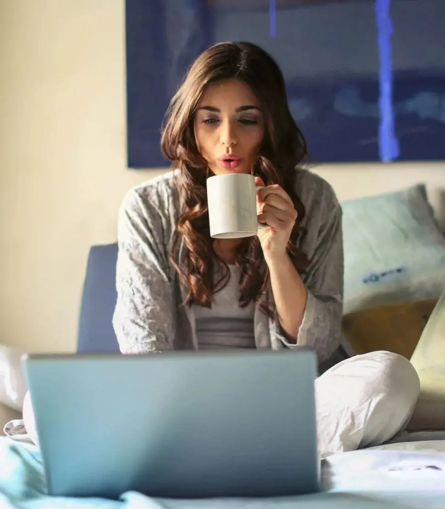 Gen Z woman working from the comfort of her home