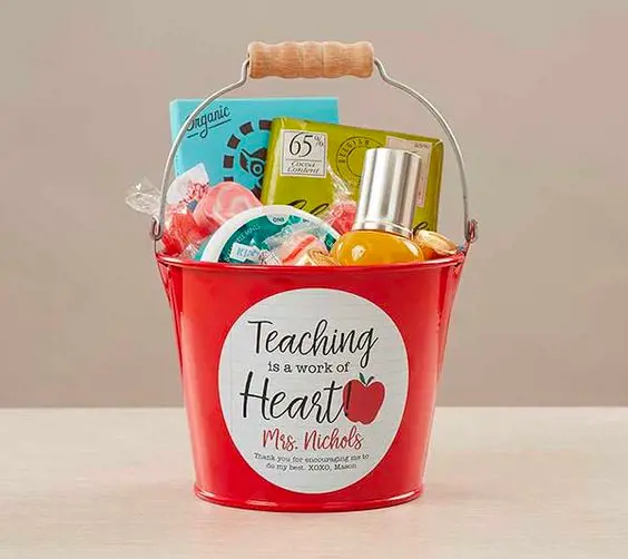 A handpicked basket with different gifts stuffed inside as a thank you for educators