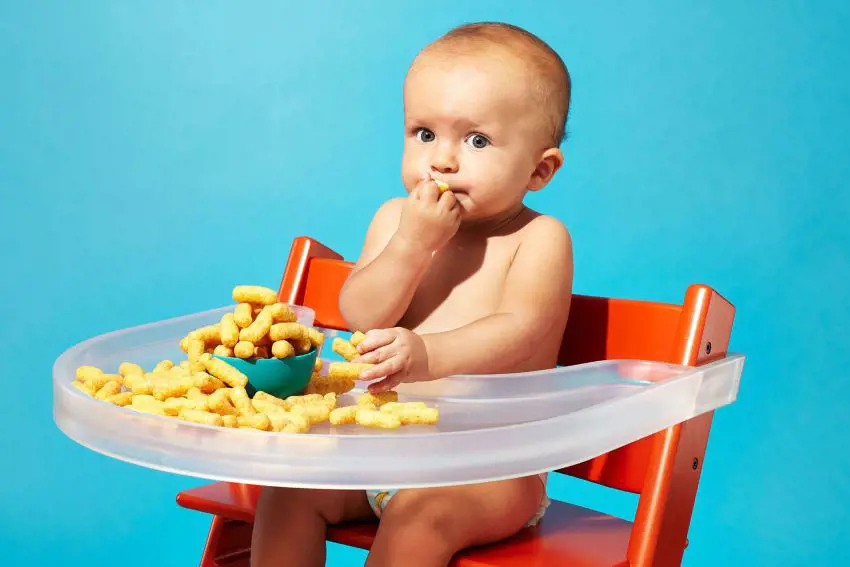 Kid munching on a tasty peanut treat